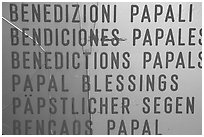 Papal Blessings sign in many languages. Vatican City (black and white)