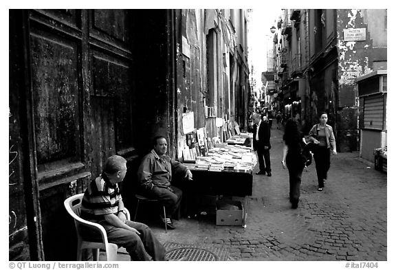 Via San Giogio dei Librai, one of the liveliest roads in Spaccanapoli. Naples, Campania, Italy (black and white)