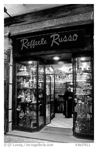 Store selling religious statuettes. Naples, Campania, Italy (black and white)