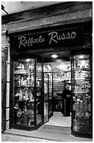 Store selling religious statuettes. Naples, Campania, Italy (black and white)