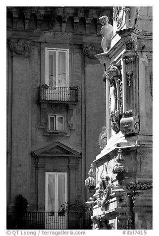 Base of Guglia in Piazza San Domenico Maggiore. Naples, Campania, Italy (black and white)