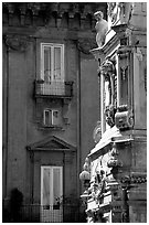 Base of Guglia in Piazza San Domenico Maggiore. Naples, Campania, Italy (black and white)