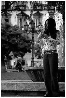 Young woman talking on a cell phone. Naples, Campania, Italy ( black and white)