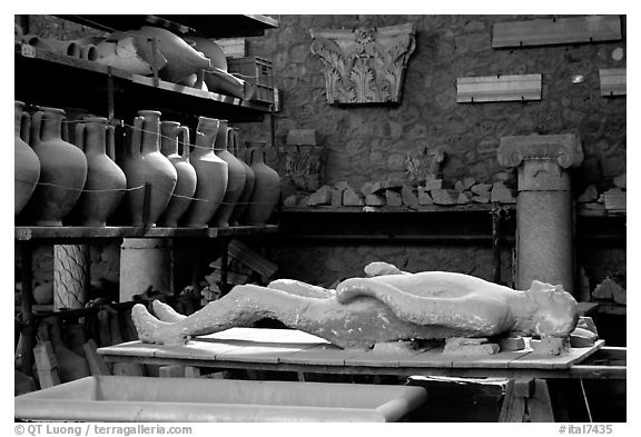 Artifacts found during the excavations, including a petrified man. Pompeii, Campania, Italy