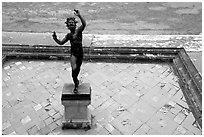 Statue in Casa del Fauno (Villa of the Faune). Pompeii, Campania, Italy (black and white)