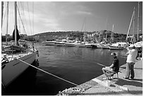 Fishing in the yacht harbor, Agropoli. Campania, Italy (black and white)