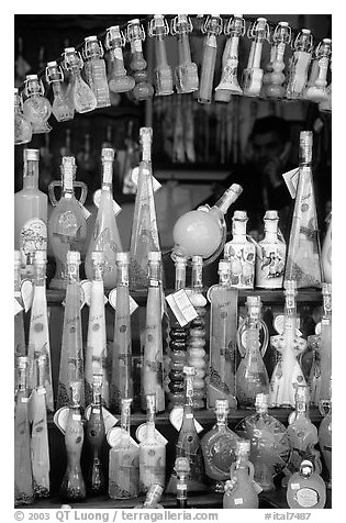 Bottles of Lemoncelo, the local lemon-based liquor, Amalfi. Amalfi Coast, Campania, Italy (black and white)