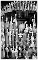 Bottles of Lemoncelo, the local lemon-based liquor, Amalfi. Amalfi Coast, Campania, Italy ( black and white)