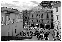 Plazza with wedding party seen from the stairs of Duomo Sant'Andrea, Amalfi. Amalfi Coast, Campania, Italy (black and white)