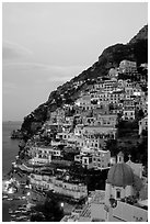 Positano at dawn, with the ceramic dome of Chiesa di Santa Maria Assunta in the foreground. Amalfi Coast, Campania, Italy ( black and white)