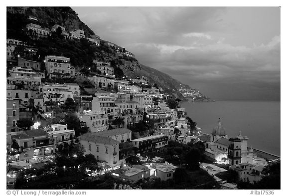 Positano lights coming up at dusk. Amalfi Coast, Campania, Italy