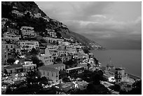 Positano lights coming up at dusk. Amalfi Coast, Campania, Italy (black and white)