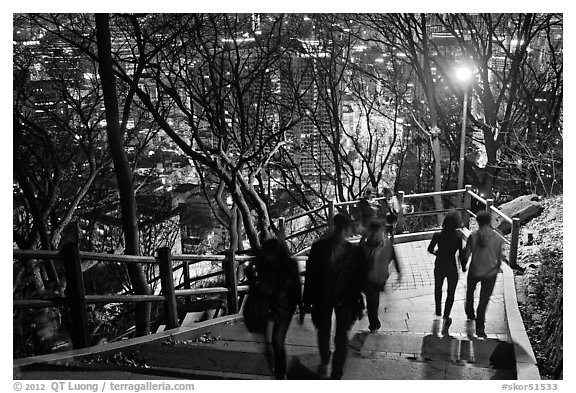 People on Namsan stairs by night. Seoul, South Korea (black and white)