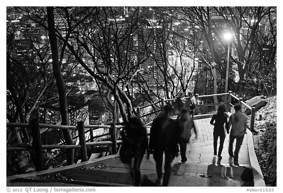 People on Namsan stairs by night. Seoul, South Korea