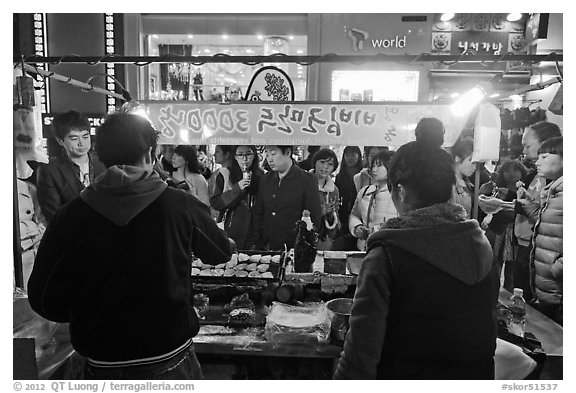 Street food by night. Seoul, South Korea (black and white)