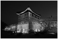 Suwon Hwaseong Fortress tower at night. South Korea (black and white)