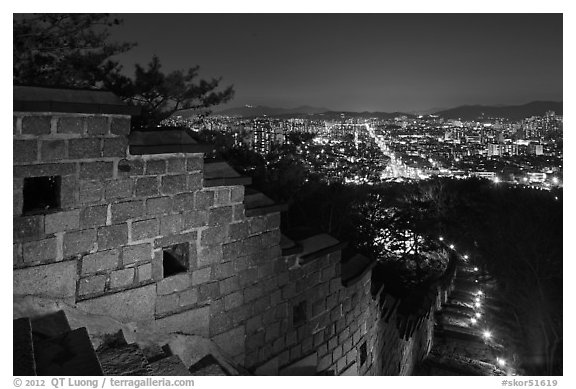 Rampart wall and city lights, Suwon Hwaseong Fortress. South Korea