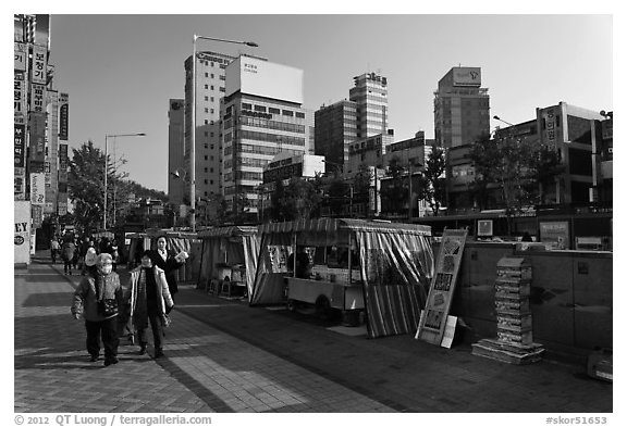 Street lined up with food stalls. Seoul, South Korea (black and white)