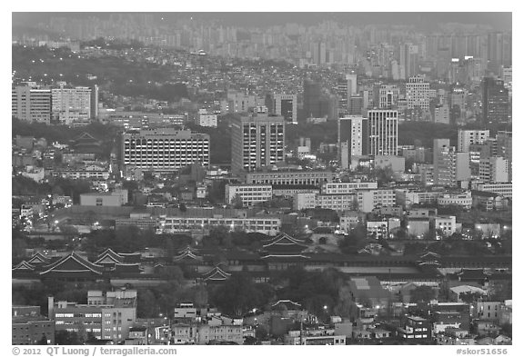 Gyeongbokgung and high-rises at dusk. Seoul, South Korea