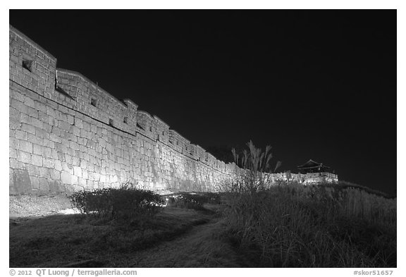 Suwon Hwaseong Fortress wall at night. South Korea (black and white)