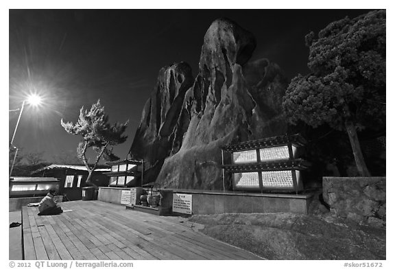 Sacred shamanist site of Seon-bawi at night. Seoul, South Korea (black and white)