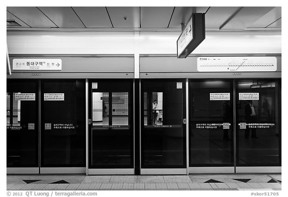 Platform screen doors in subway. Daegu, South Korea (black and white)