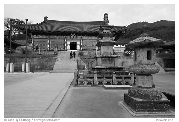 Three-story stone pagoda and main hall, Haeinsa Temple. South Korea (black and white)