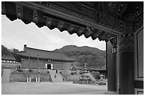 Haeinsa Temple framed by entrance gate. South Korea (black and white)