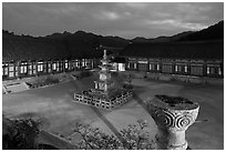 Stone pagoda and courtyard at dusk, Haeinsa Temple. South Korea (black and white)