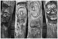 Sculptures on wood stems. Hahoe Folk Village, South Korea (black and white)