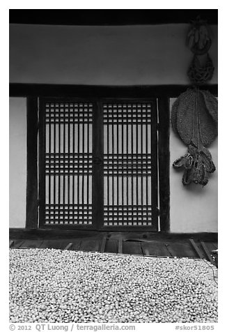 Nuts, screen door, and baskets. Hahoe Folk Village, South Korea (black and white)