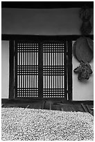 Nuts, screen door, and baskets. Hahoe Folk Village, South Korea (black and white)