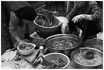 Women preparing kim chee. Gyeongju, South Korea (black and white)