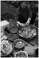 Woman during early winter kim chee preparation. Gyeongju, South Korea ( black and white)