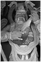 Wooden statue with musical instrument, Bulguk-sa. Gyeongju, South Korea (black and white)