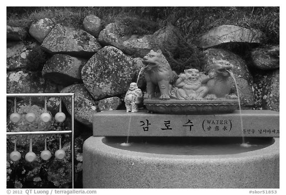 Water fountain and drinking cups, Seokguram. Gyeongju, South Korea (black and white)