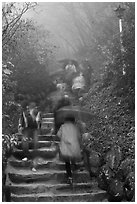 Blurred tourists on rainy day, Seokguram. Gyeongju, South Korea ( black and white)