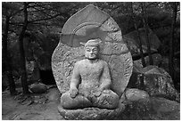 Seated stone Yeora buddha statue, Namsan Mountain. Gyeongju, South Korea (black and white)