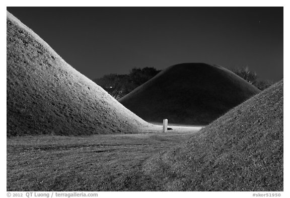 Burial mounds and tombs at night. Gyeongju, South Korea (black and white)