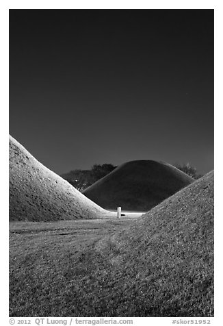 Grassy burial tumulus at night. Gyeongju, South Korea (black and white)