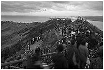 Tourists on top of Seongsang Ilchulbong. Jeju Island, South Korea ( black and white)