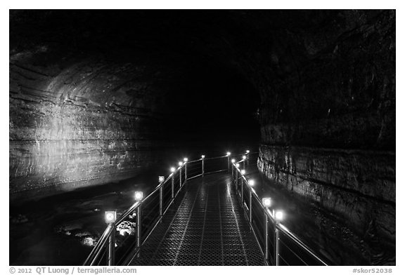 Metal walkway in Manjanggul cave. Jeju Island, South Korea (black and white)