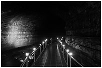 Metal walkway in Manjanggul cave. Jeju Island, South Korea ( black and white)