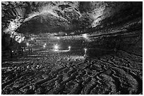 Floor with hardened lava flow in  Manjanggul cave. Jeju Island, South Korea ( black and white)