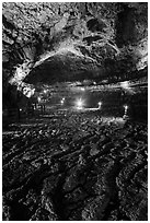 Hardened lava braids on floor of Geomunoreum. Jeju Island, South Korea ( black and white)