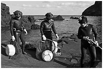 Elderly Haeneyo women in wetsuits. Jeju Island, South Korea (black and white)