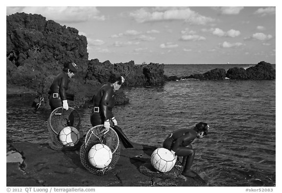 Old Haeneyo women preparing for dive. Jeju Island, South Korea