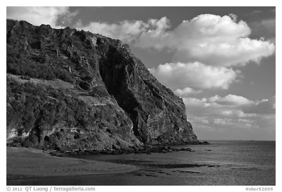 Steep cliffs of Seongsang Ilchulbong. Jeju Island, South Korea (black and white)