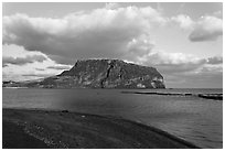 Beach and Tuff Cone,  Ilchulbong. Jeju Island, South Korea ( black and white)