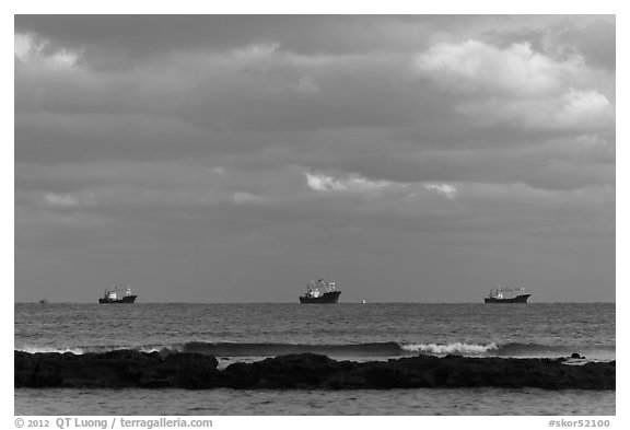 Fishing boats offshore. Jeju Island, South Korea (black and white)